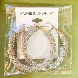 Brand New! Never Worn! NWT Glittery Sparkly Shiny Silver Hoop Earrings.